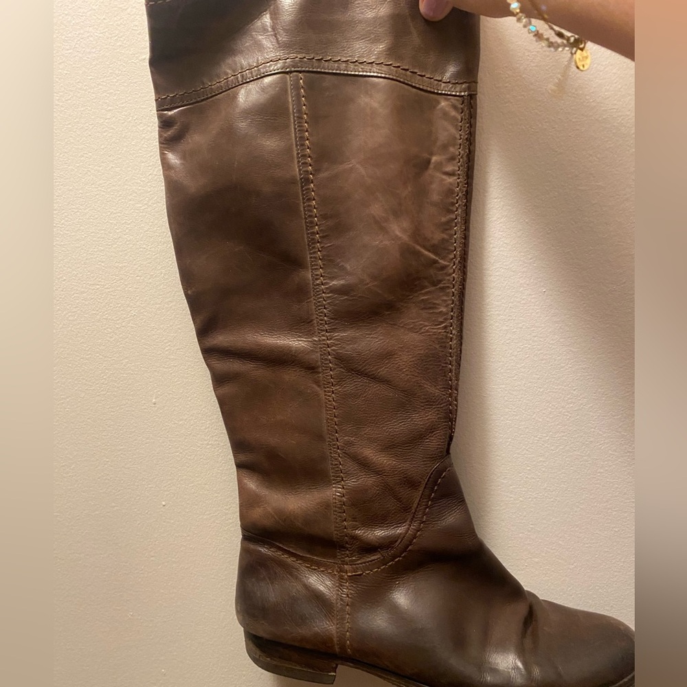 Brown cowboy style boots. Leather boots